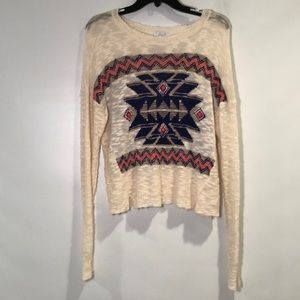 Delia’s sweater